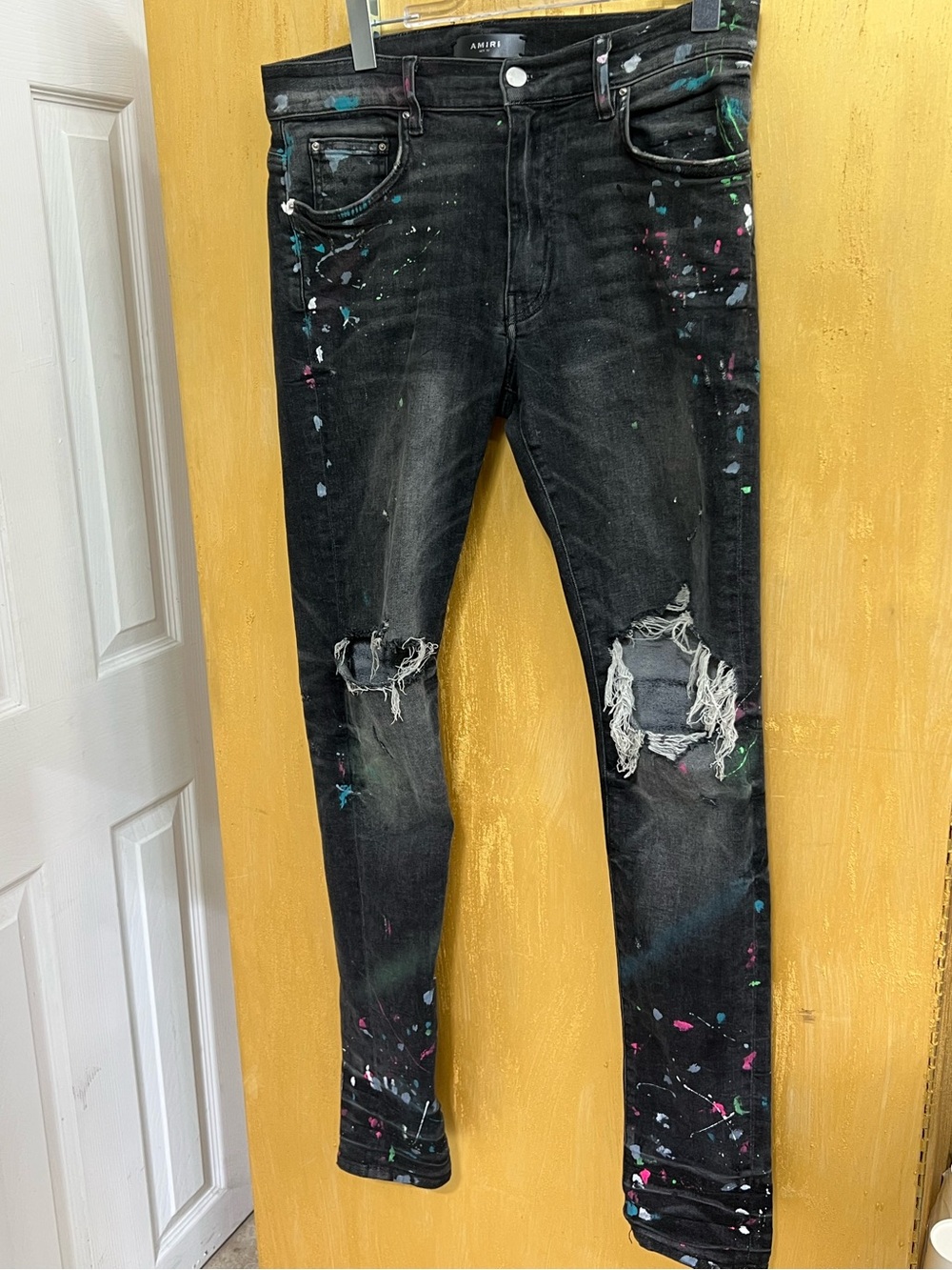 AMIRI Black Skinny Jeans with Multicolor Paint Splatter